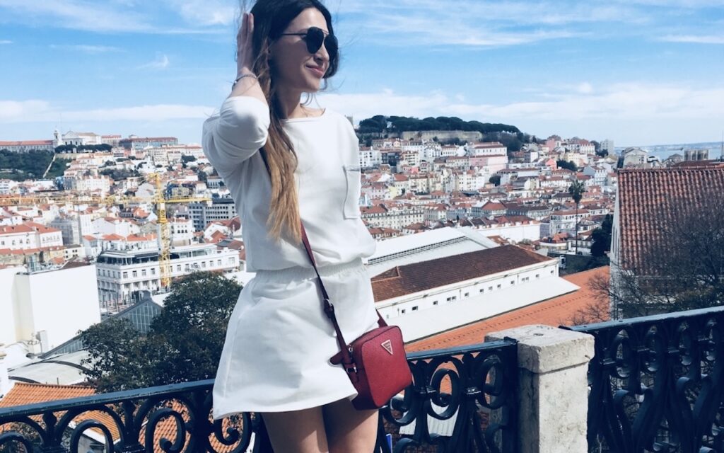 Ekaterina, the creator of Hello My Lisbon, overlooking the city